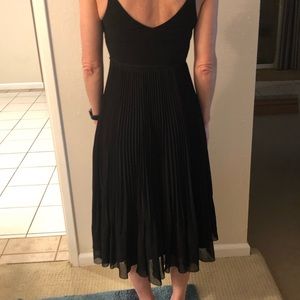 Wrap dress with pleated skirt